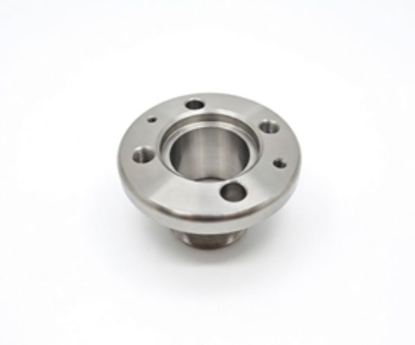 Machined flange with threaded bore and four bolt pattern