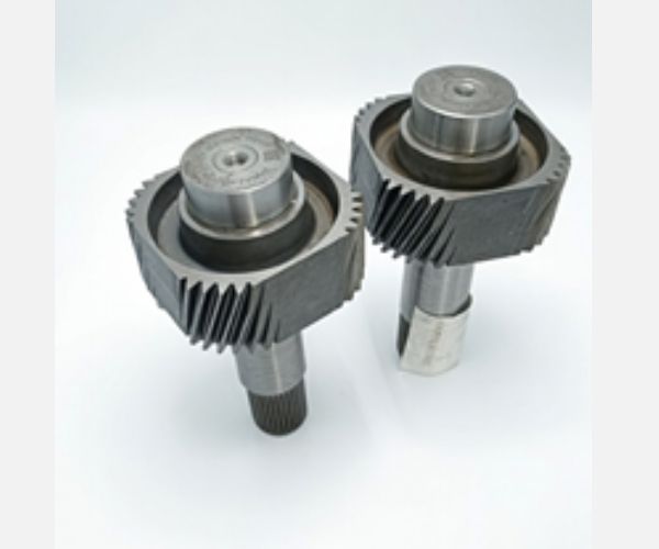 Hardened helical gear shaft assembly